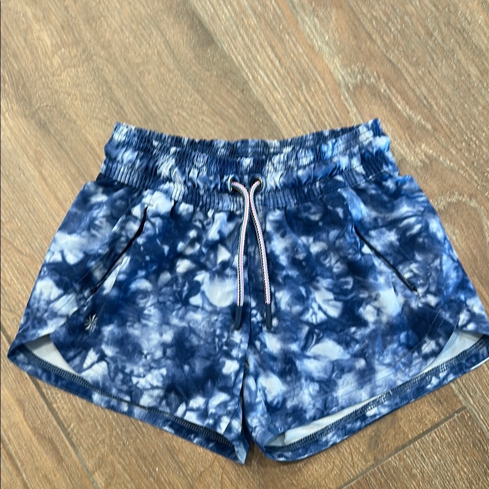 Athleta girls Blue Tie-Dye running Shorts. Size S/7.